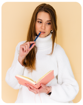 Female student holding a notebook representing trusted accounting capstone assignment support and expert academic assistance in UK.
